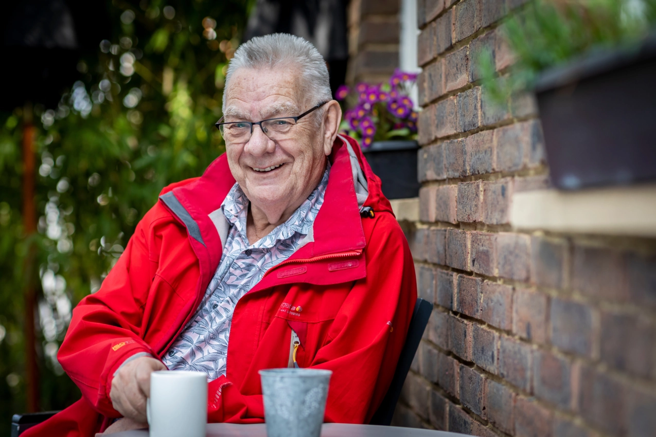 Man smiling with coffee_Centre for Better Ageing